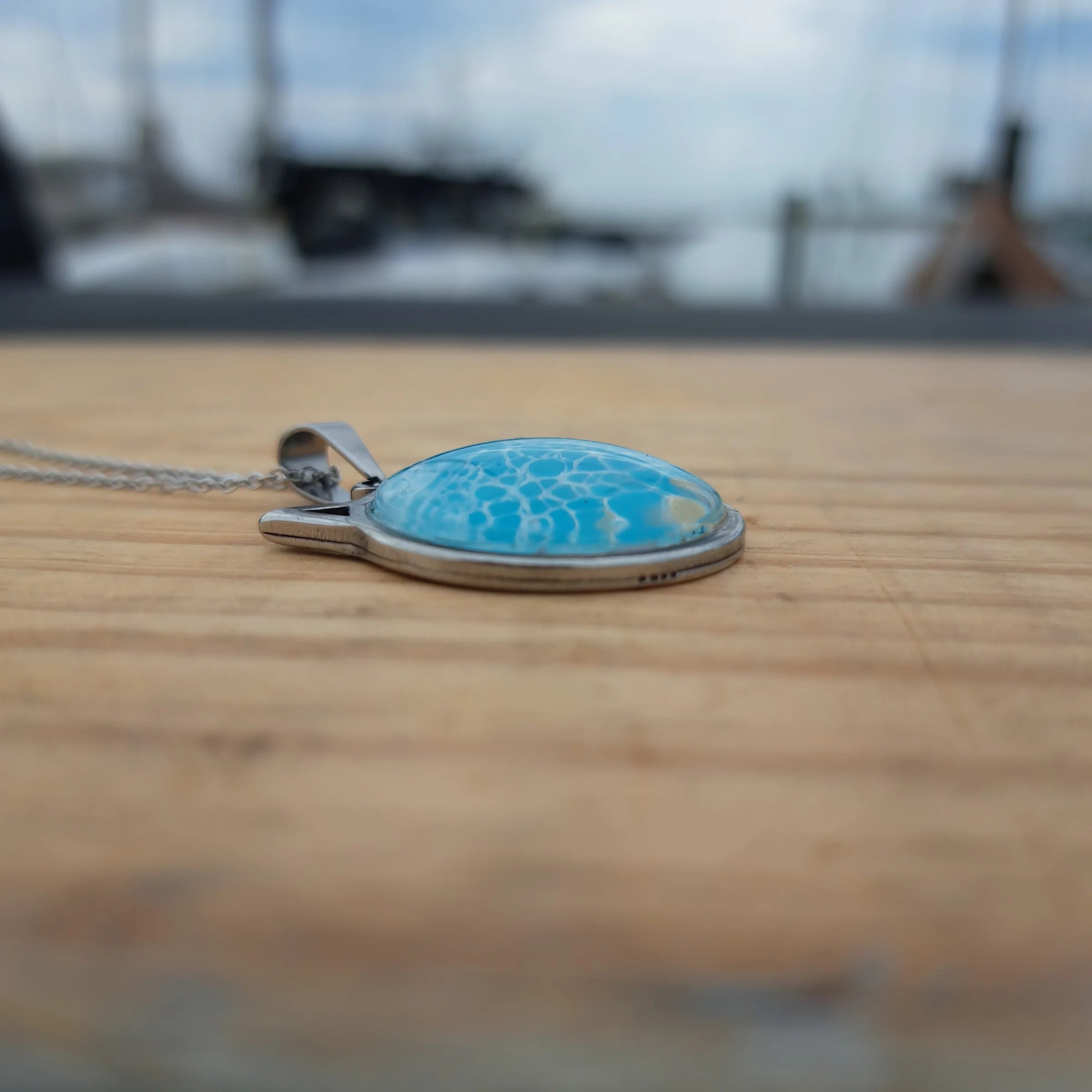 Beautiful blue cat pendant inspired by ocean depths. Stainless steel with 17" chain